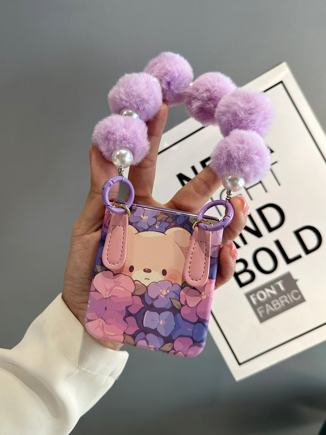 Floral Foldable Phone Case with Pom-Pom Strap