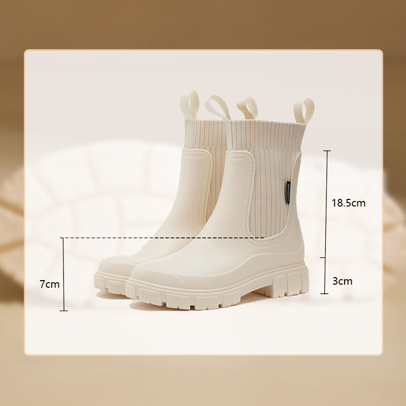 Waterproof, non-slip boots with a thick mid-calf sole