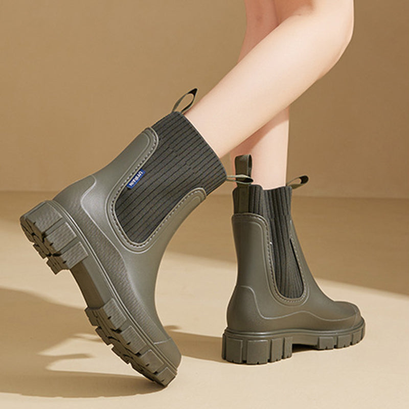 Waterproof, non-slip boots with a thick mid-calf sole