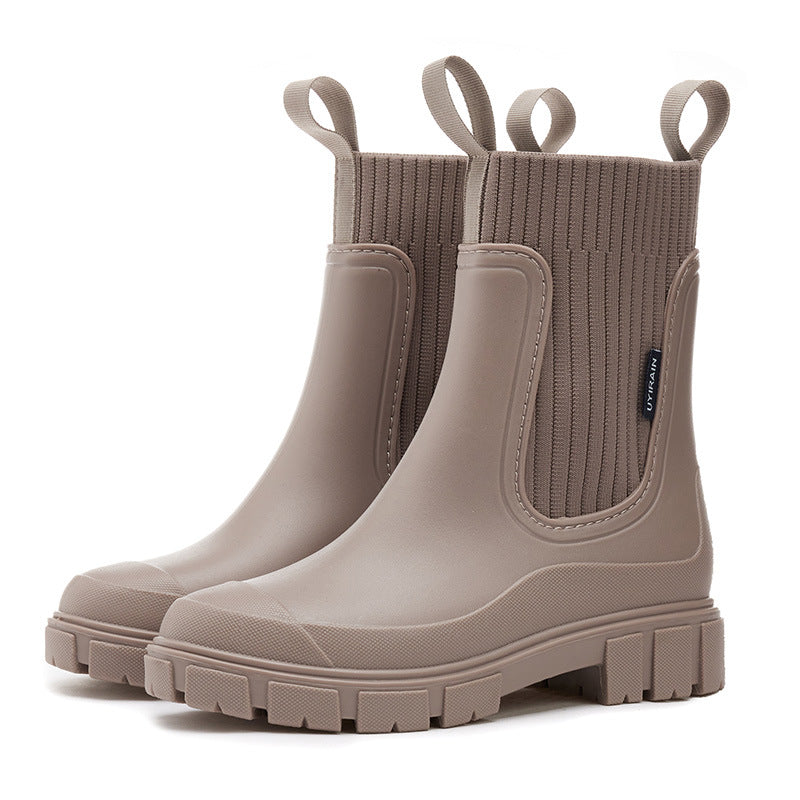 Waterproof, non-slip boots with a thick mid-calf sole