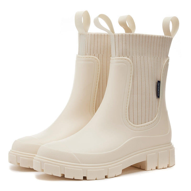 Waterproof, non-slip boots with a thick mid-calf sole