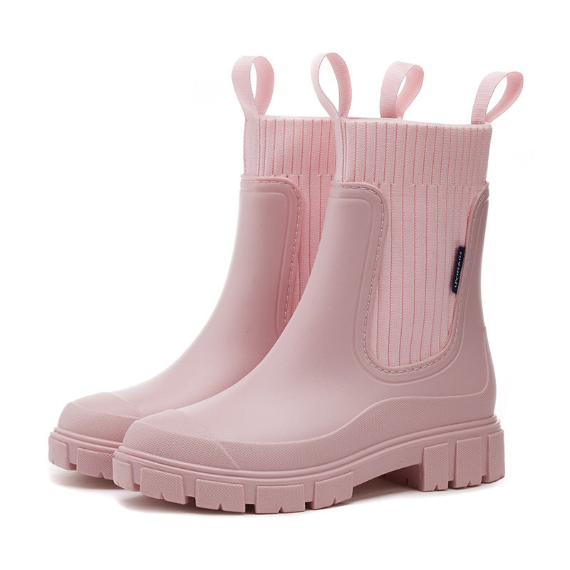 Waterproof, non-slip boots with a thick mid-calf sole